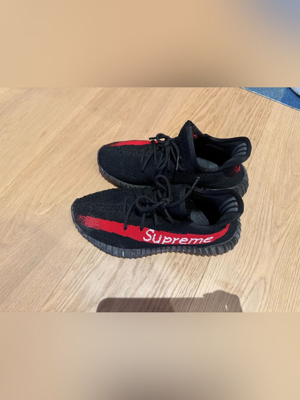 Supreme x Yeezy Black and Red Knit Sneakers